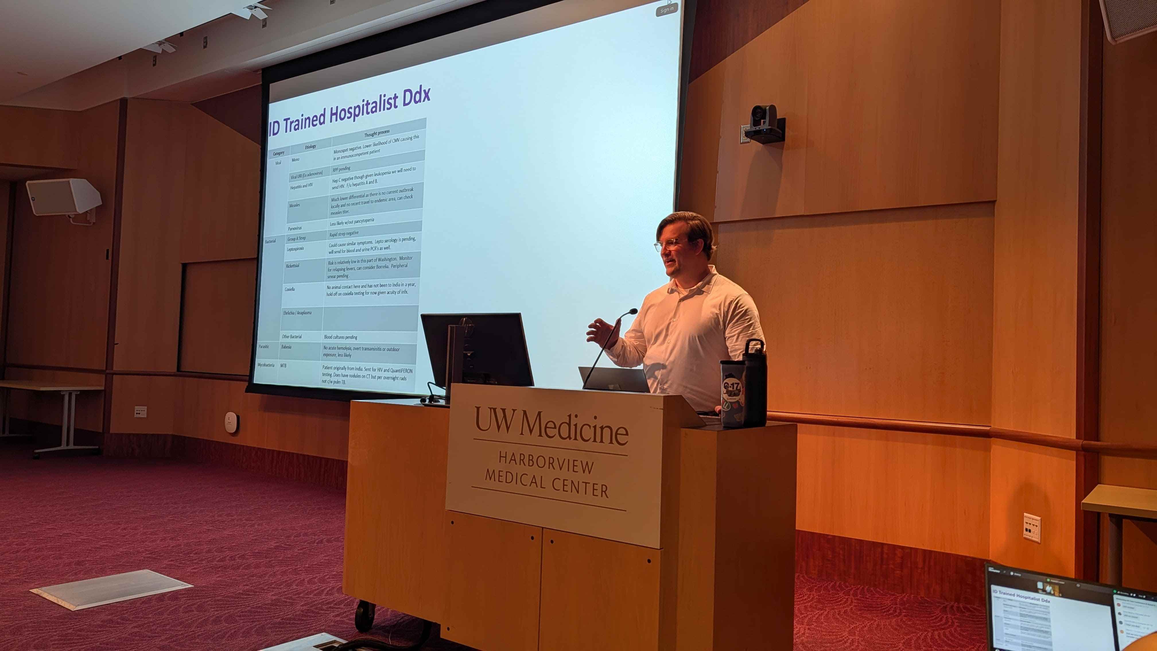 Student presenting at a podium